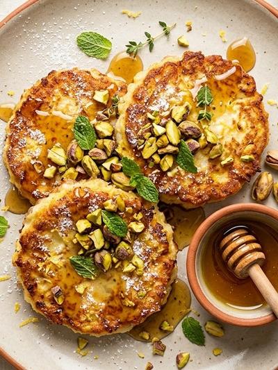 Air Fryer Sicilian Lemon-Ricotta Egg Fritters with Pistachio Honey