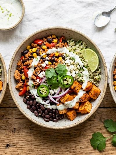 Meal Prep Mexican Chipotle Turkey and Sweet Potato Bowls with Lime Crema
