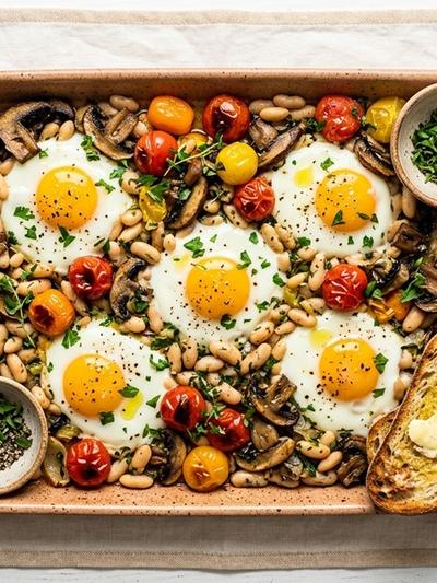 Sheet Pan British Baked Eggs with Mushrooms, Tomatoes, and White Beans